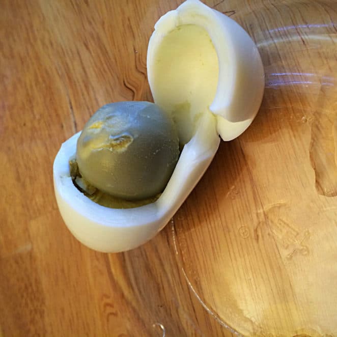 Hard boiled egg with greenish yolk
