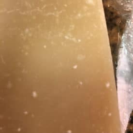 Crystals like these on cheese are not mold