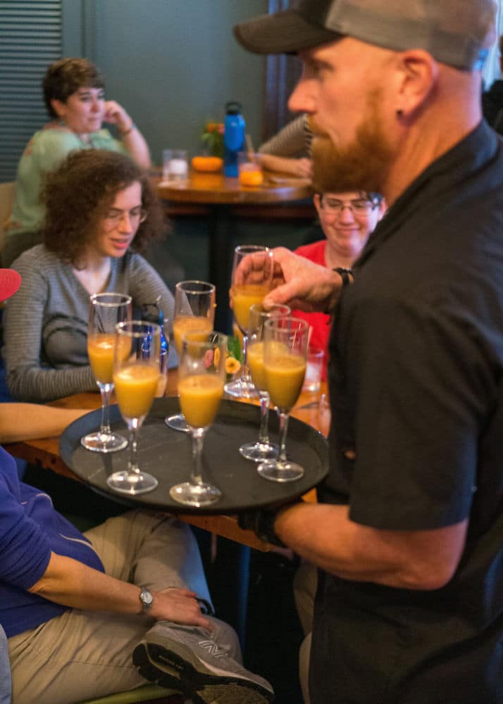 Brendan Ambrose serves the Great Pumpkin, a drink made with ground up pumpkin seeds.