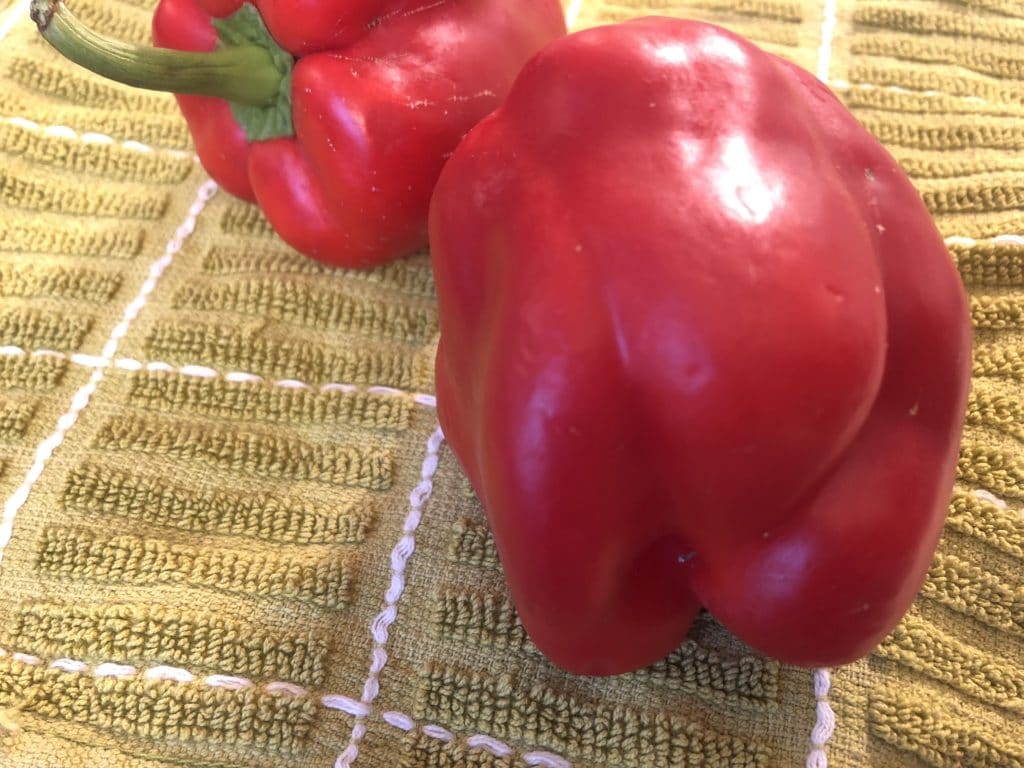 Red peppers with scars