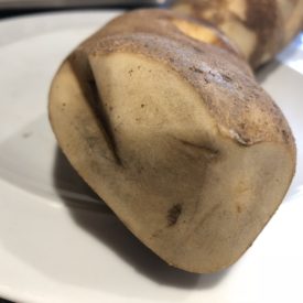 Potato with blackened area