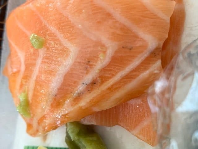 Black dots on salmon