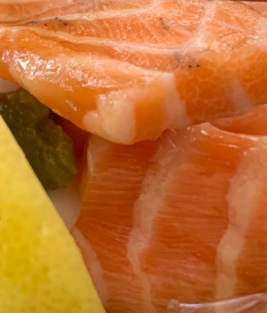 Likely melanin spots on salmon sashimi