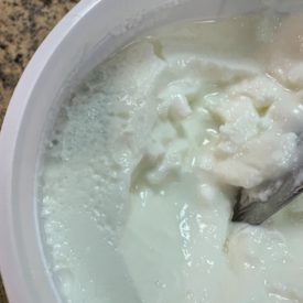 Yogurt with mold on the surface