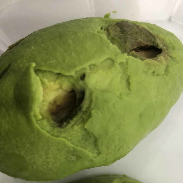 dark holes bruises in avocado