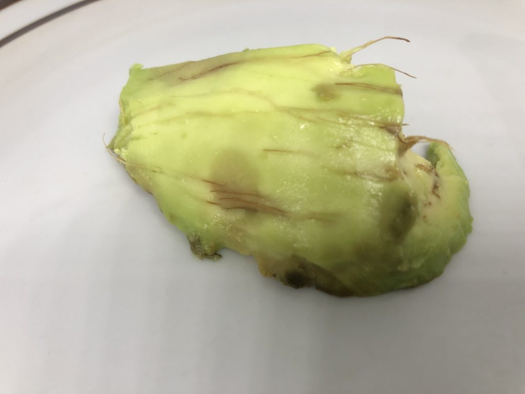 brown avocado with strings