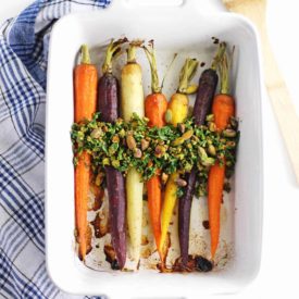 Rainbow carrots with carrot green pistachio topping
